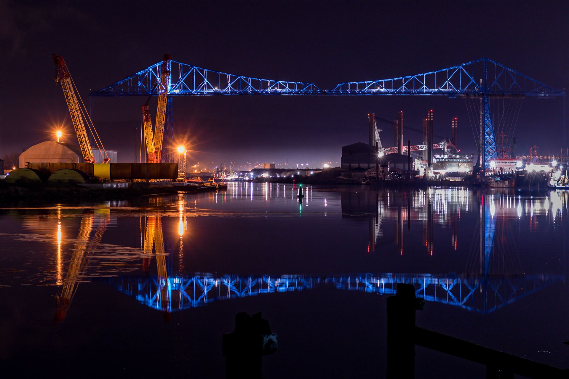 Transporter Bridge Reflections - The Transporter Bridge Reflection. To buy this image or many more of this iconic bridge, follow the link
https://www.clickasnap.com/i/ozo4f31dpbldx6zo by AJ Stoves Photography