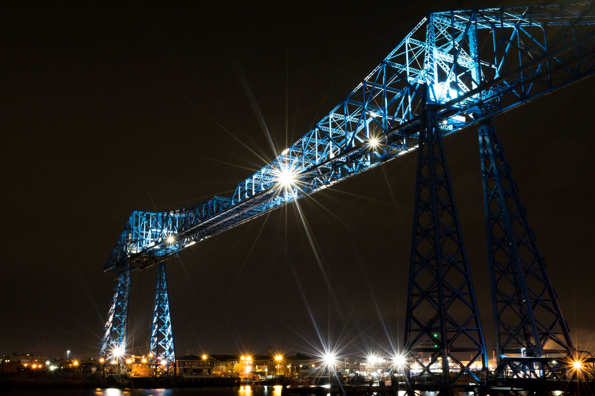 Transporter Bridge Post Clarence At Night - One of the most famous bridges in the UK The Transporter Bridge at night, To buy this image or many more of this iconic bridge, follow the link
https://www.clickasnap.com/i/432a83g7z5ewrczj by AJ Stoves Photography
