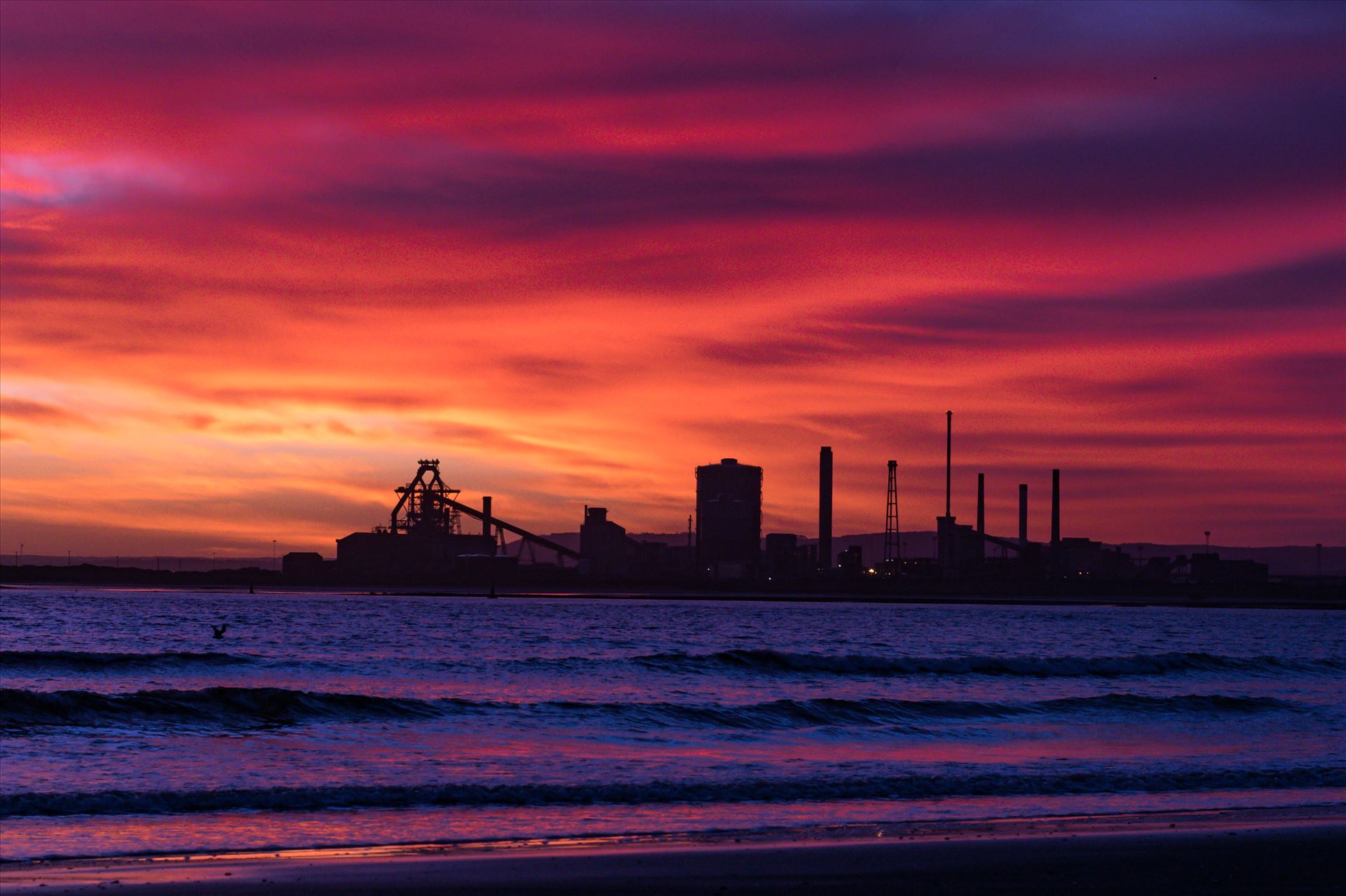 SSI Redcar Steel Works Sunrise, Red sky in the Morning - Taken on the 2/01/18 on a very cold Seaton Beach looking over the river to SSI Redcar Steel Works by AJ Stoves Photography