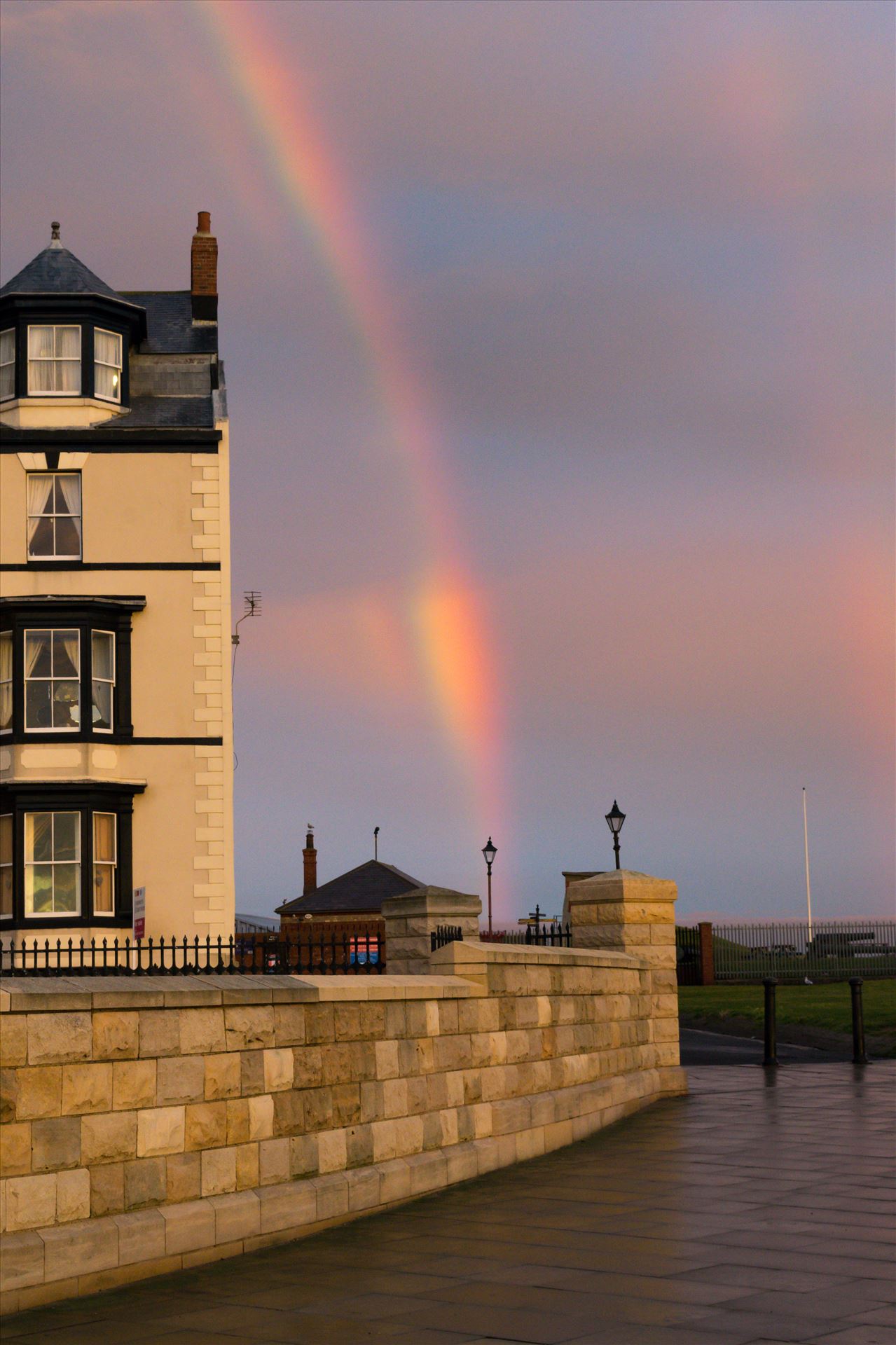 Rainbow at Sunrise - A rainbow at first light at Hartlepool Headland by AJ Stoves Photography